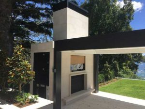 Custom cut sandstone fireplace