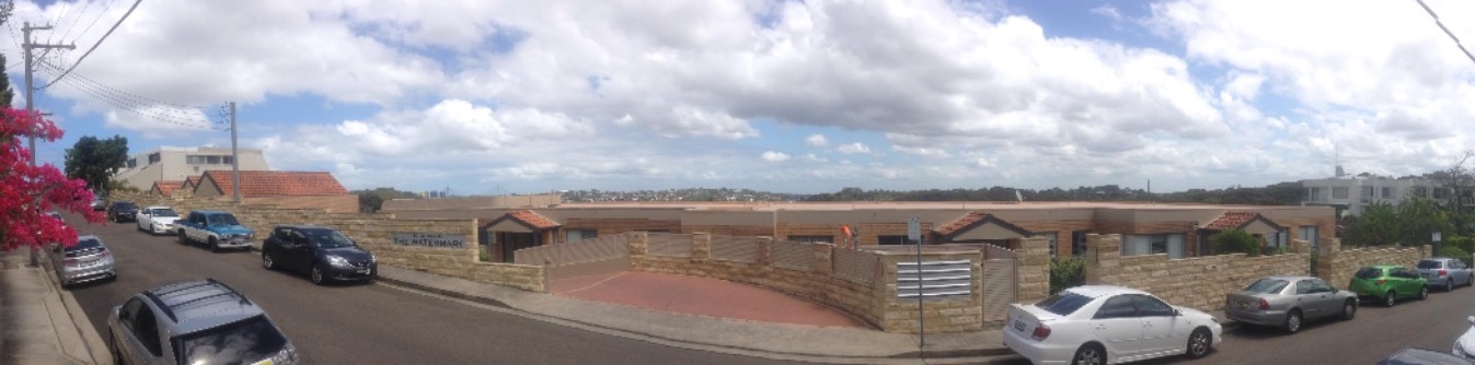 Sandstone cladding walls with 40mm caps Sydney.