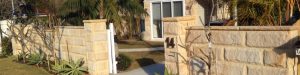 Sandstone Rock-faced cladding plus wall & pier caps