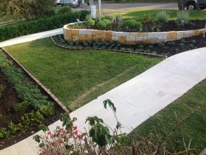 Sandstone flagging, and dry pack wall/garden edge