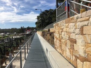 sandstone ballast blocks cut into a unique style tight join dry pack wall.