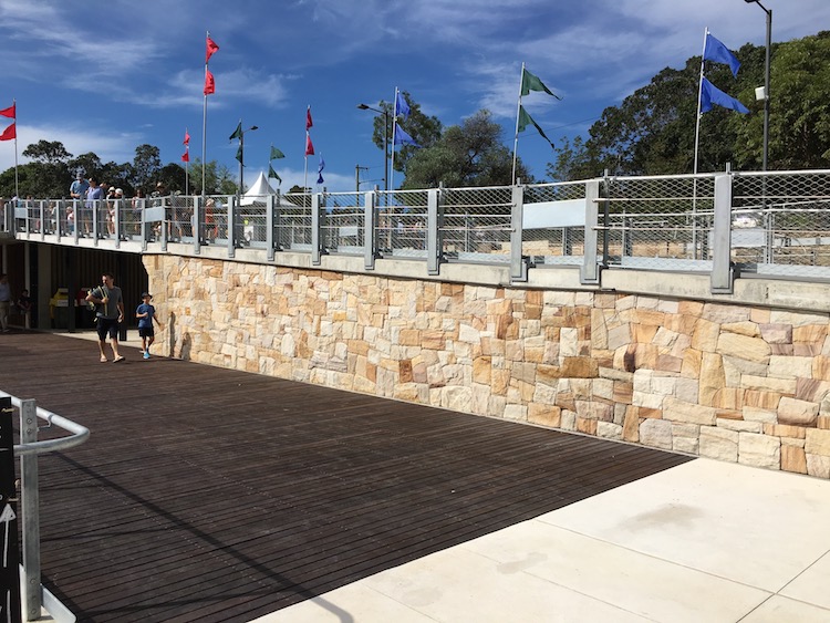 sandstone blocks split into 100 thick cladding and cut into a unique style tight join dry pack wall.