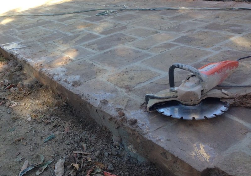 Australian Flagging;Thick Sandstone Driveway paving being cut.