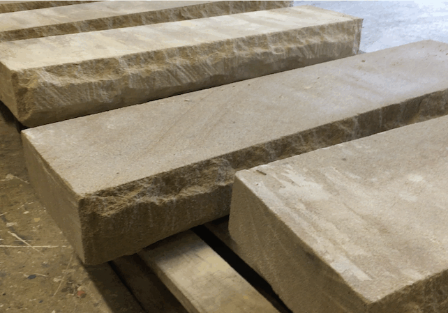 sandstone block steps rock faced and diamond sawn 800pix Australian sandstone quarry logs cut into 150mm step treads